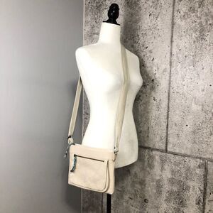 The Sak Leather Embossed Mini Crossbody